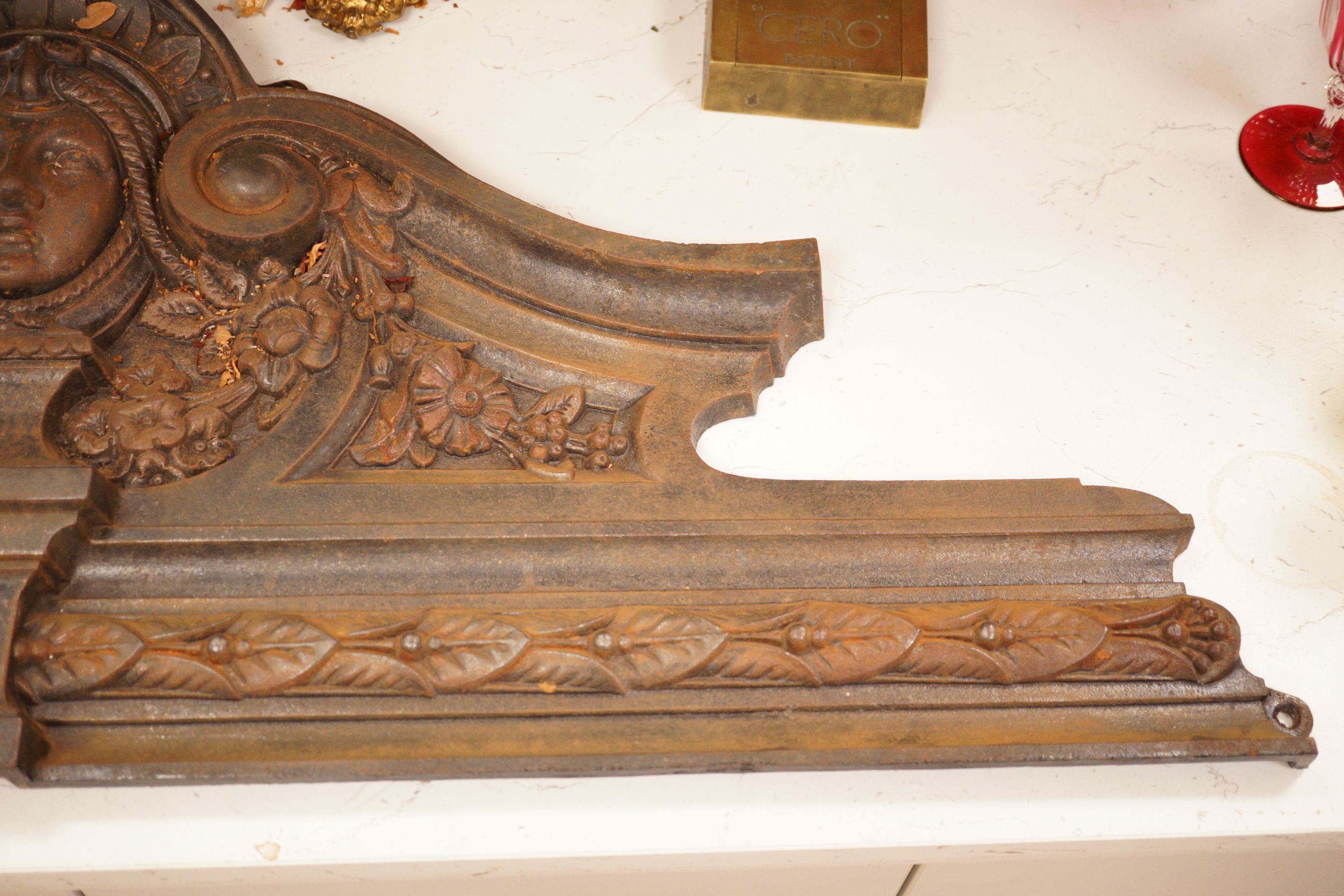 A wall mounted cast iron architectural pediment, 101cm